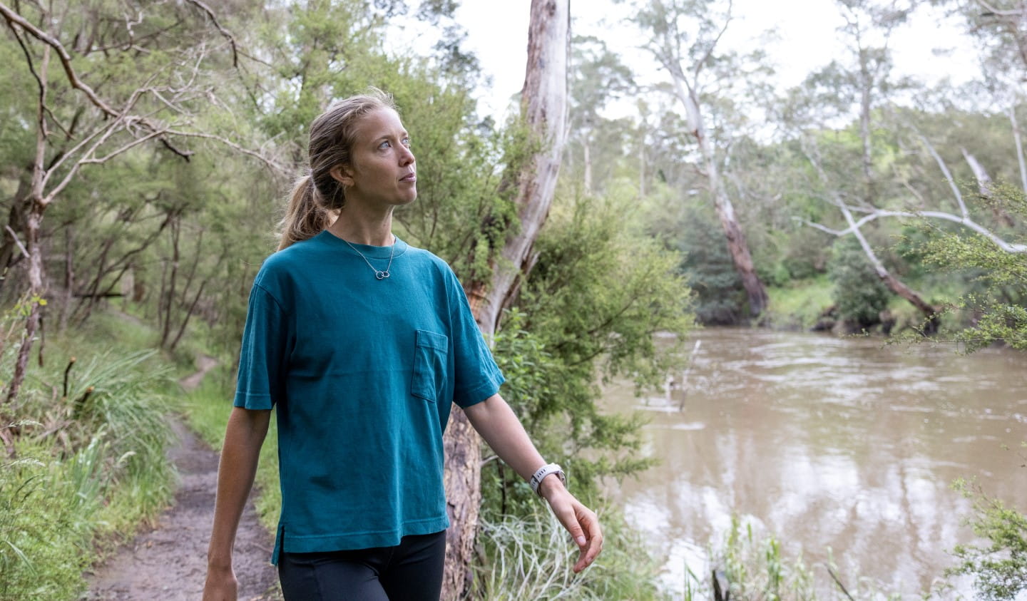 Erchana Murray-Bartlett walking next to the Yarra River in Warrandyte State Park.