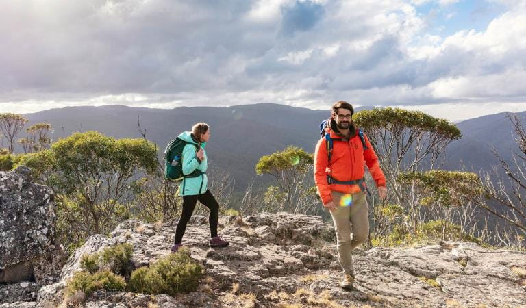 A couple in their thirties take in the view along Dead Timber Track.