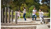 A family plays at the Brimbank Park Playscape
