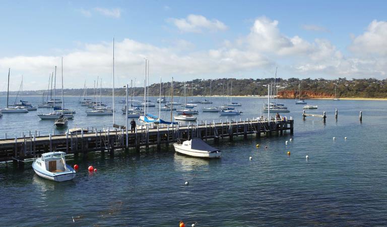 Boats moored at Mornington Pier