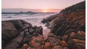 Sunset on the rocks at Whiskey Bay in Wilsons Promontory National Park.
