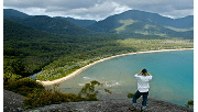 A woman looks out over Sealers Cove in Wilsons Promontory National Park