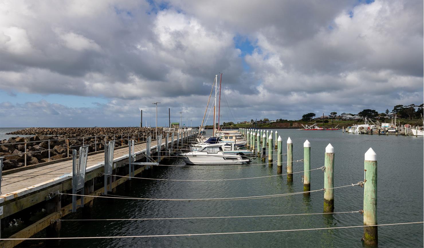 yachts berthed at a pier