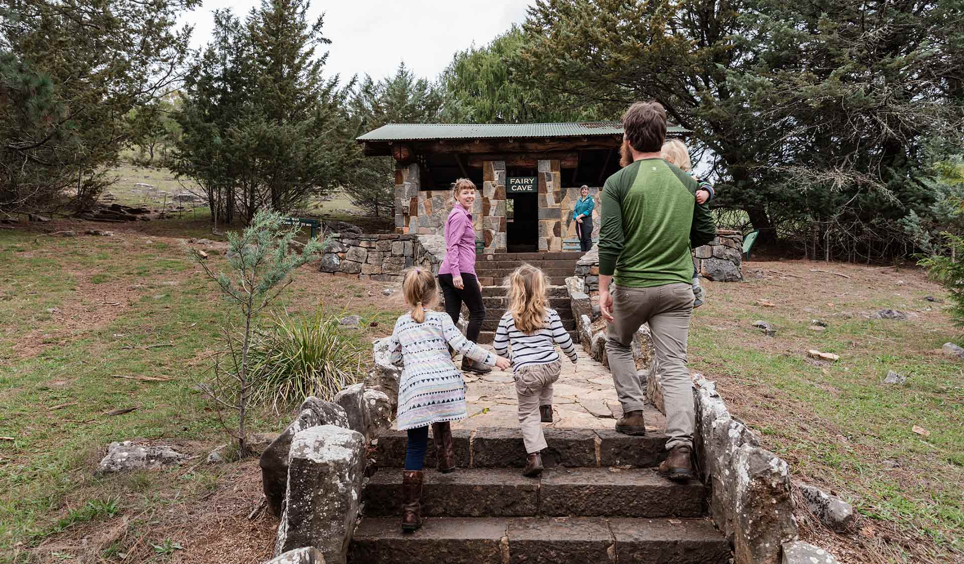 Family entering cave at Buchan Caves Reserve