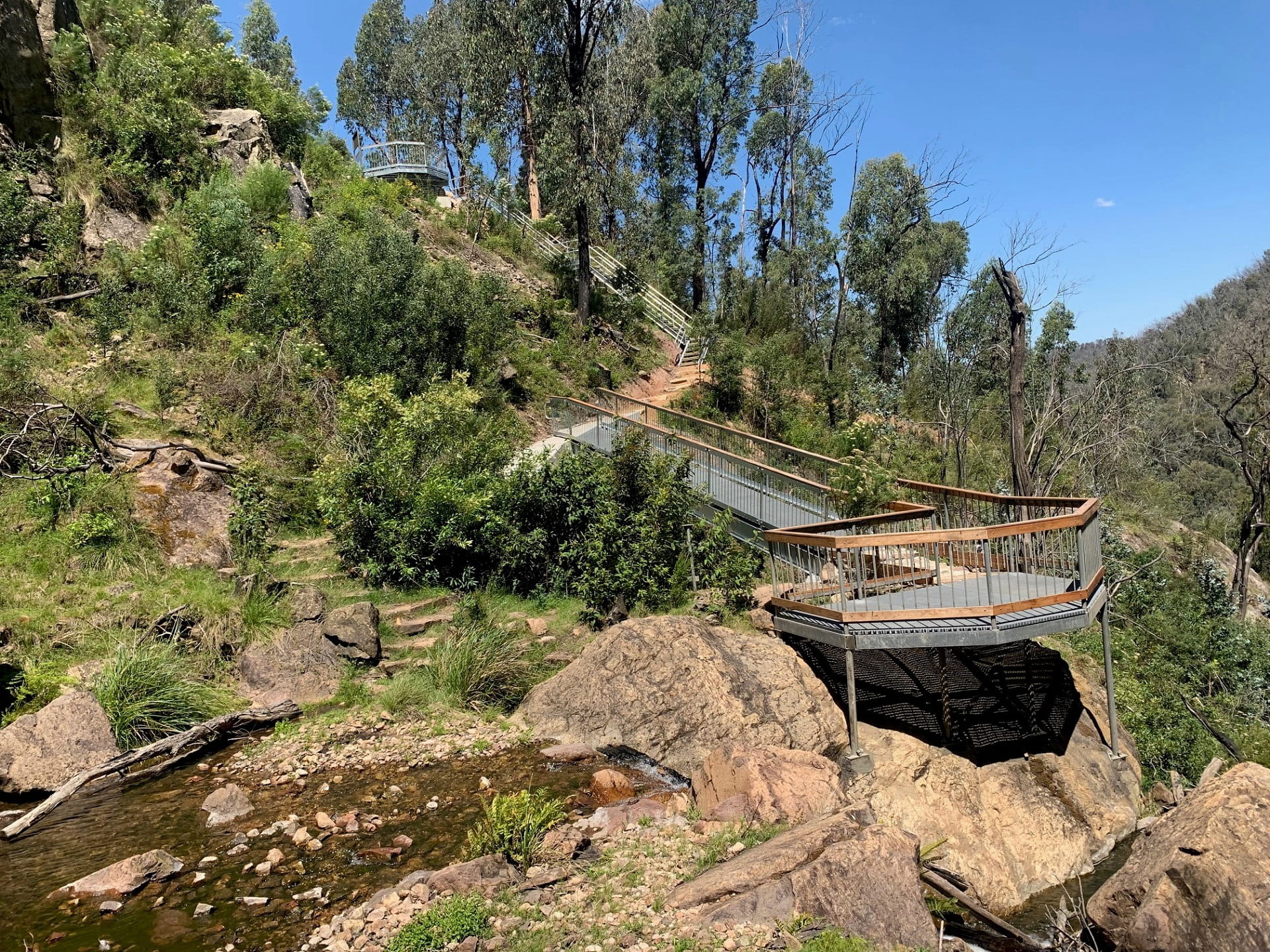 Bluff Falls lookout from the base of the falls. You can see the old stone steps to the left
