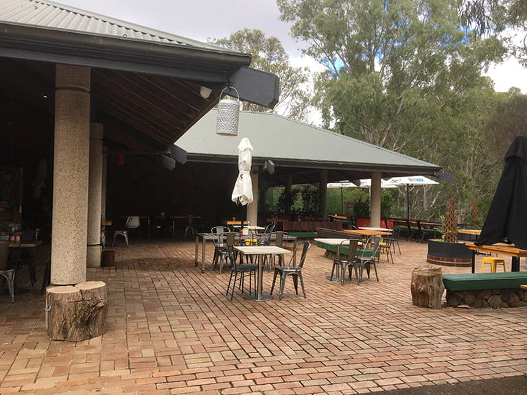Outdoor tables at the rear of the cafe at Brimbank Park