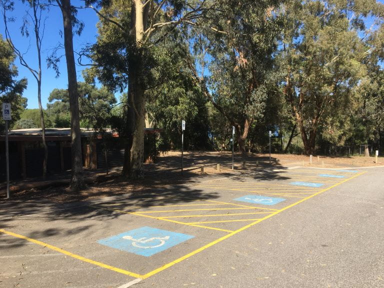Disabled parking bays near Spotted Gum toilet block at Lysterfield Park.