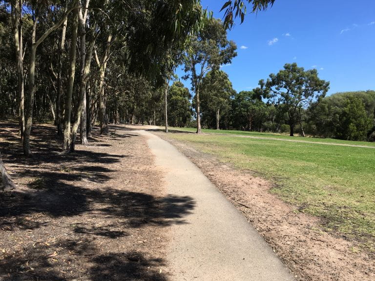 Main sealed pedestrian path connecting picnic areas at Lysterfield Park.