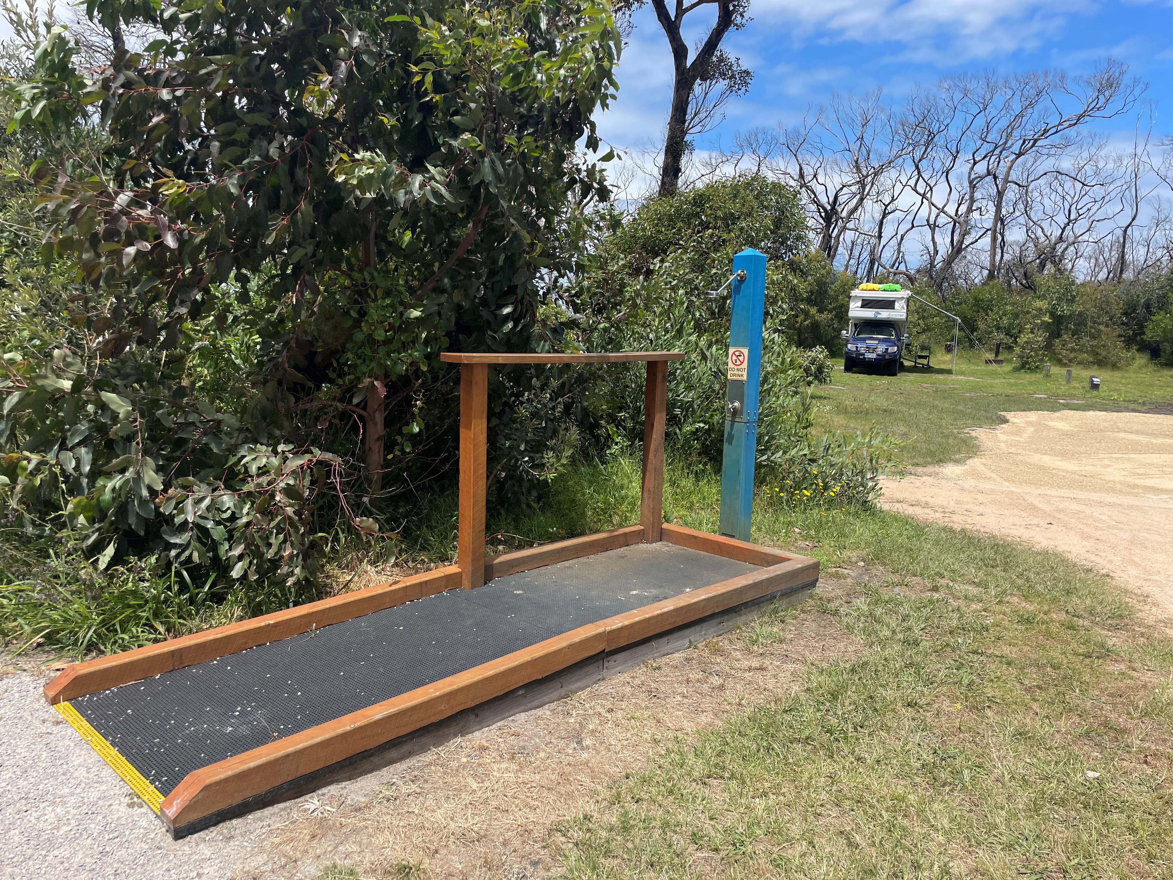 Accessible outdoor shower with ramp at Cape Conran