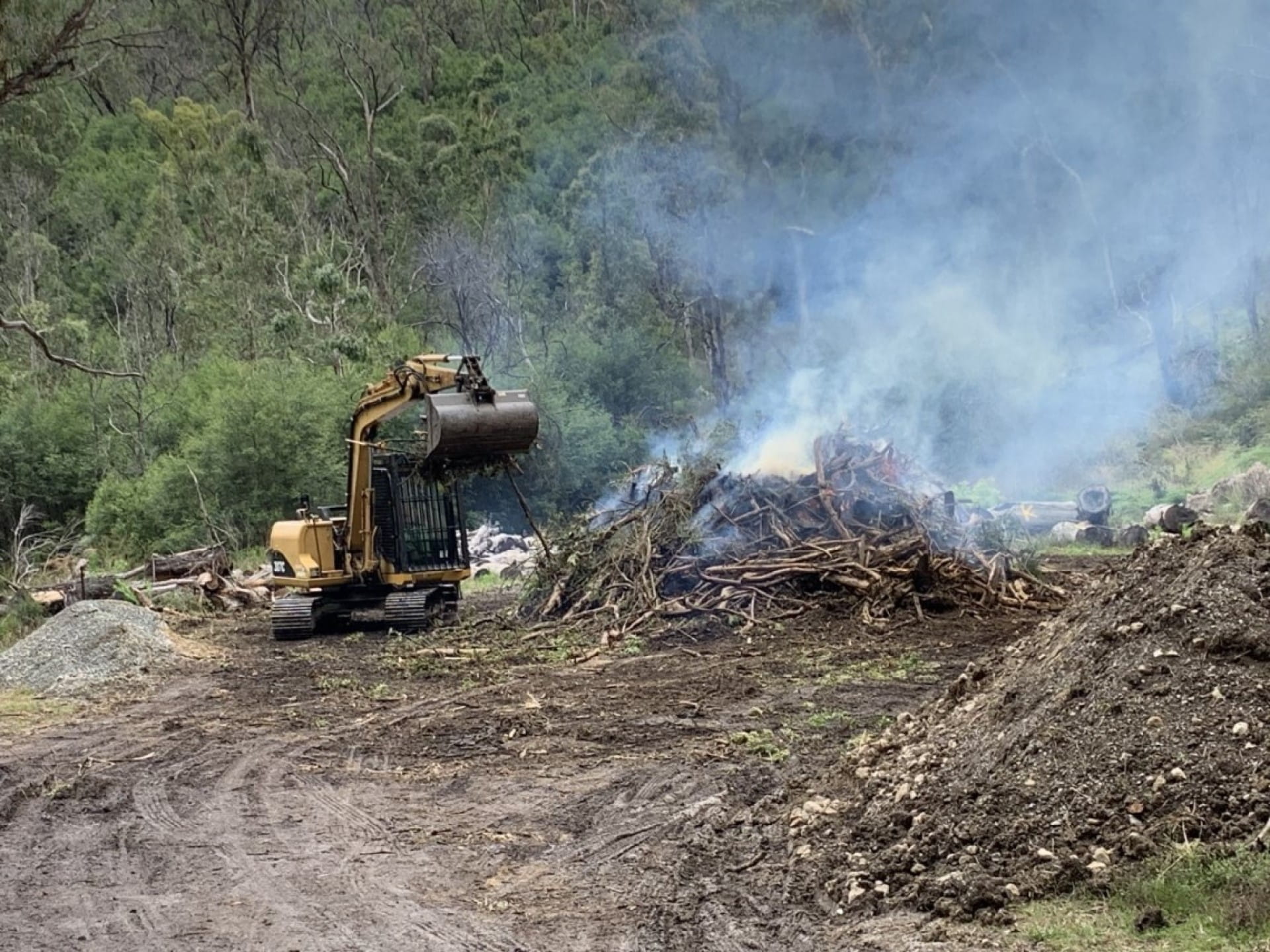 250 tonnes of vegetation debris from the December 2023 flood burned at Buchan Caves Reserve