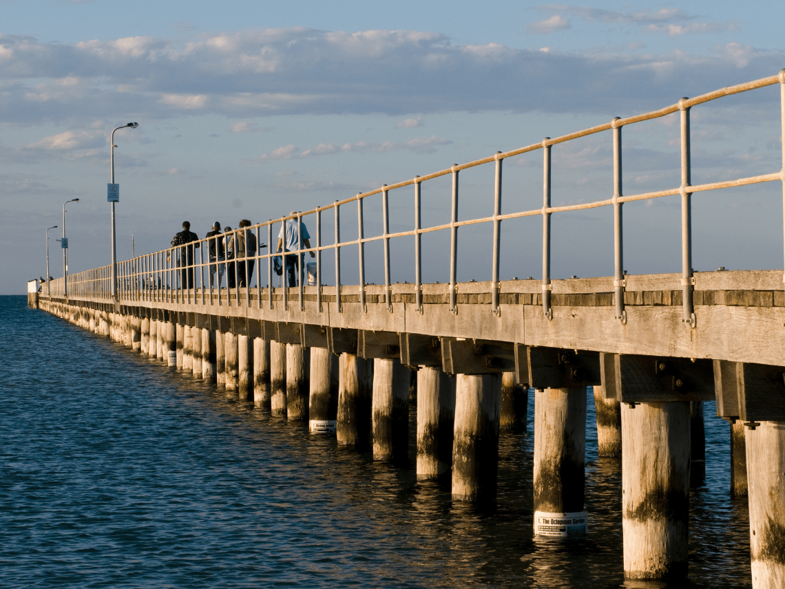 People walking on previous Rye Pier 