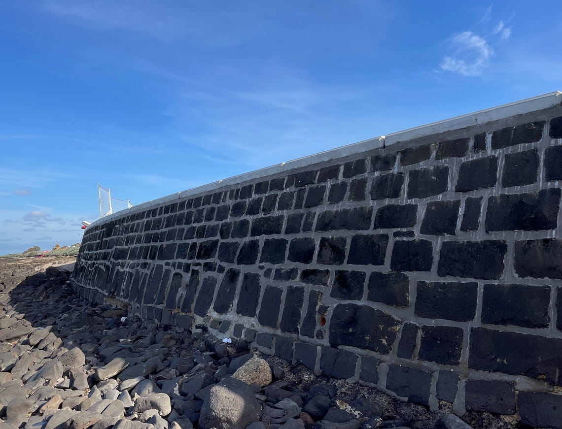 Repaired seawall at Point Gellibrand Coastal Heritage Park, including concrete capping and regrouting.