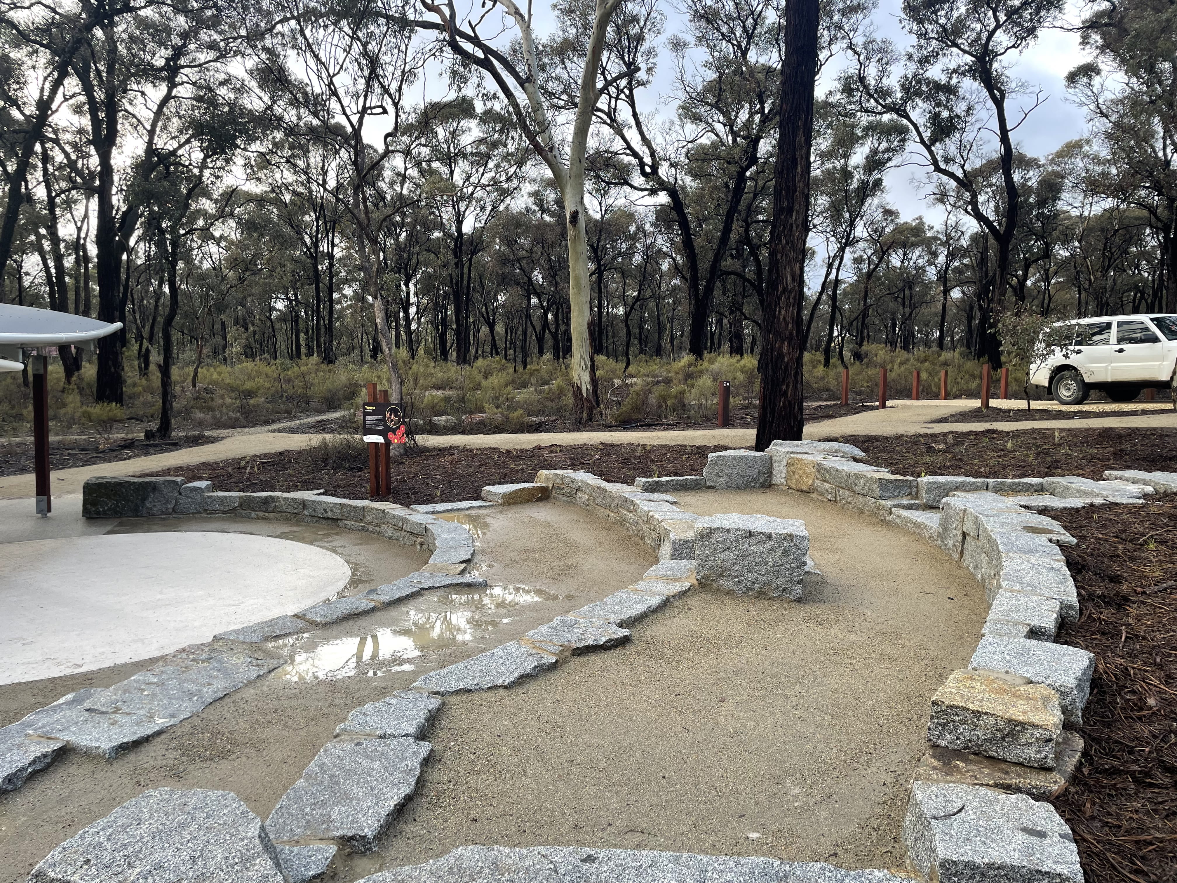 Amphitheatre seating and edge of shelter