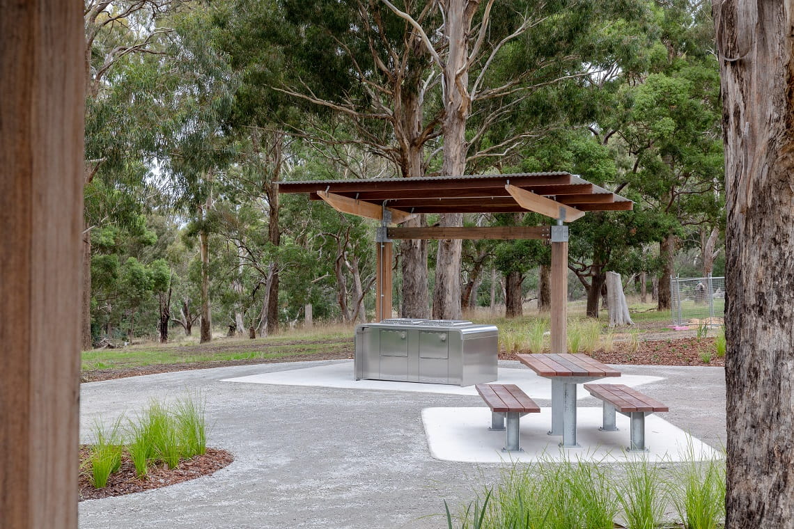 Picnic facilities at Wattle Park, which include barbecues, shelter, picnic tables, and accessible pathways.
