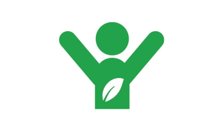 An illustrated green figure with arms in the air and a leaf cutout on the torso.