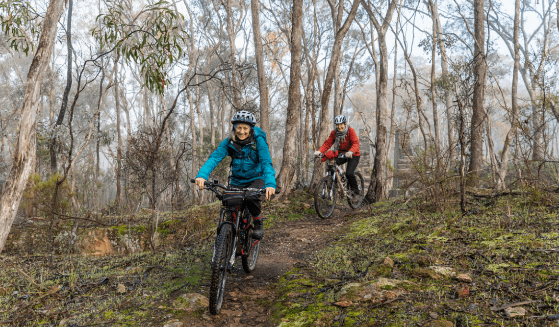 Two women bike riding along the Goldfields Track