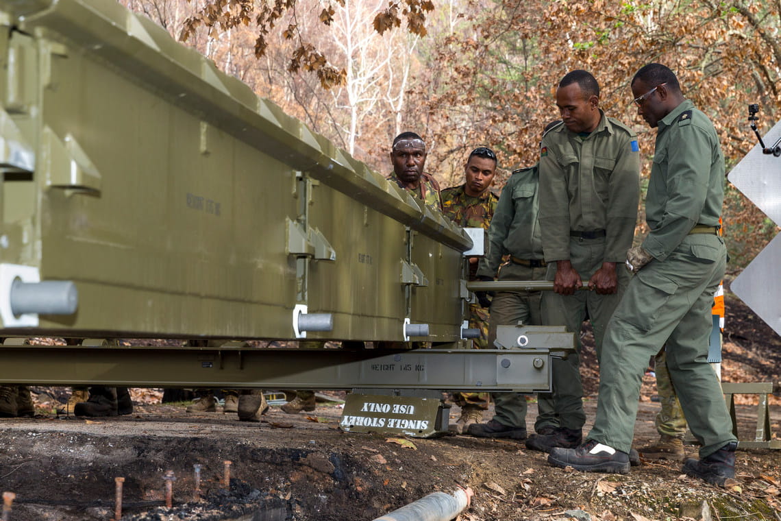 Defence forces constructing temporary bridge at Buchan Caves Reserve CREDIT: ADF