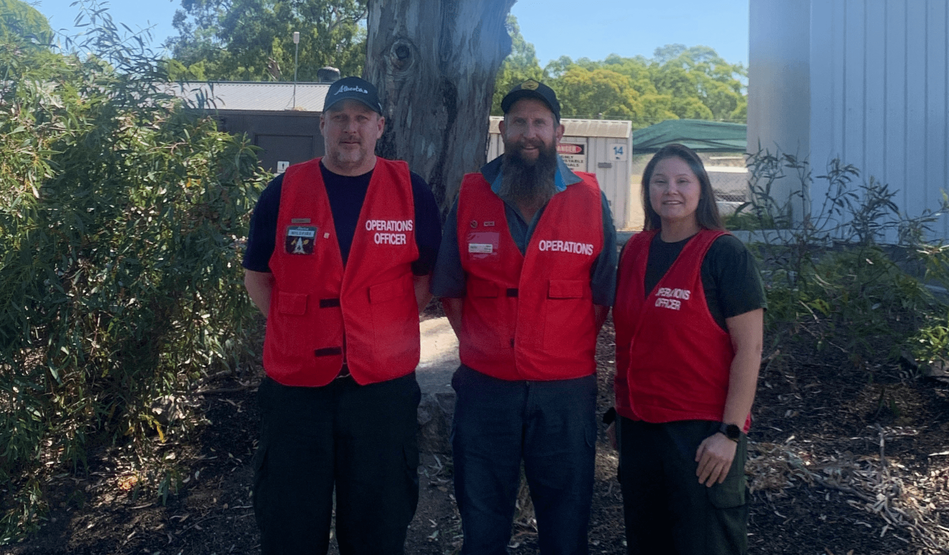 Mike Dower, Level 3 Operations Officer (middle) with Derek Gough (left) and Mel Bulldog (right), Canadian Type 1 Operations Section Chiefs.