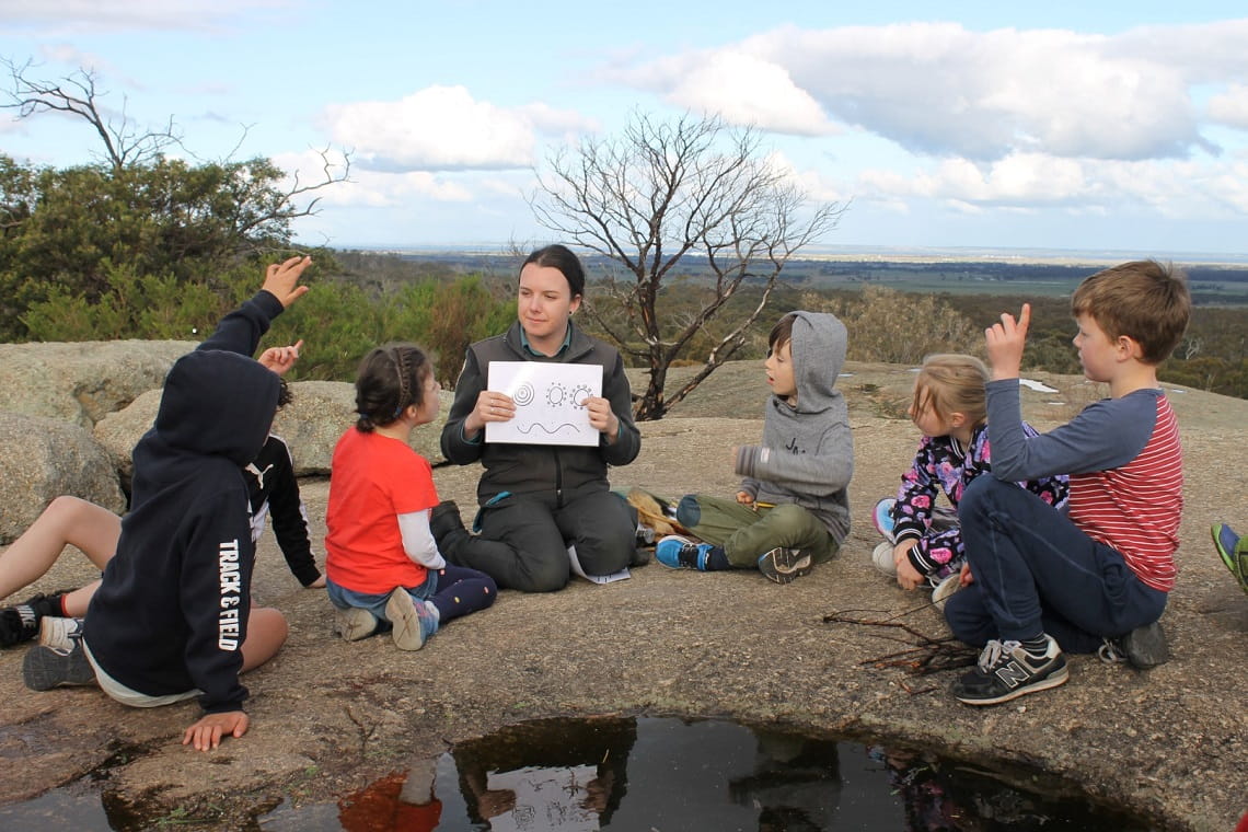 Community Engagement Ranger Ebonee with Junior Rangers in the You Yangs 