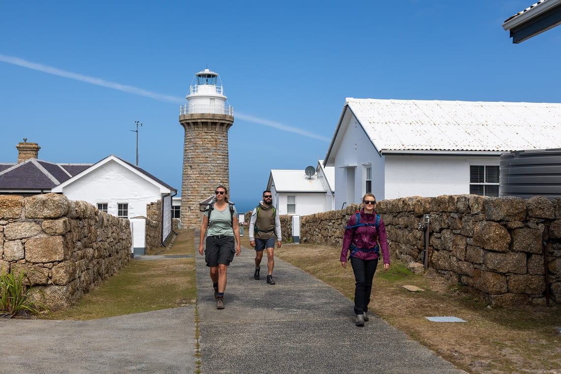 Hikers leaving lighthouse at Wilsons Prom National Park