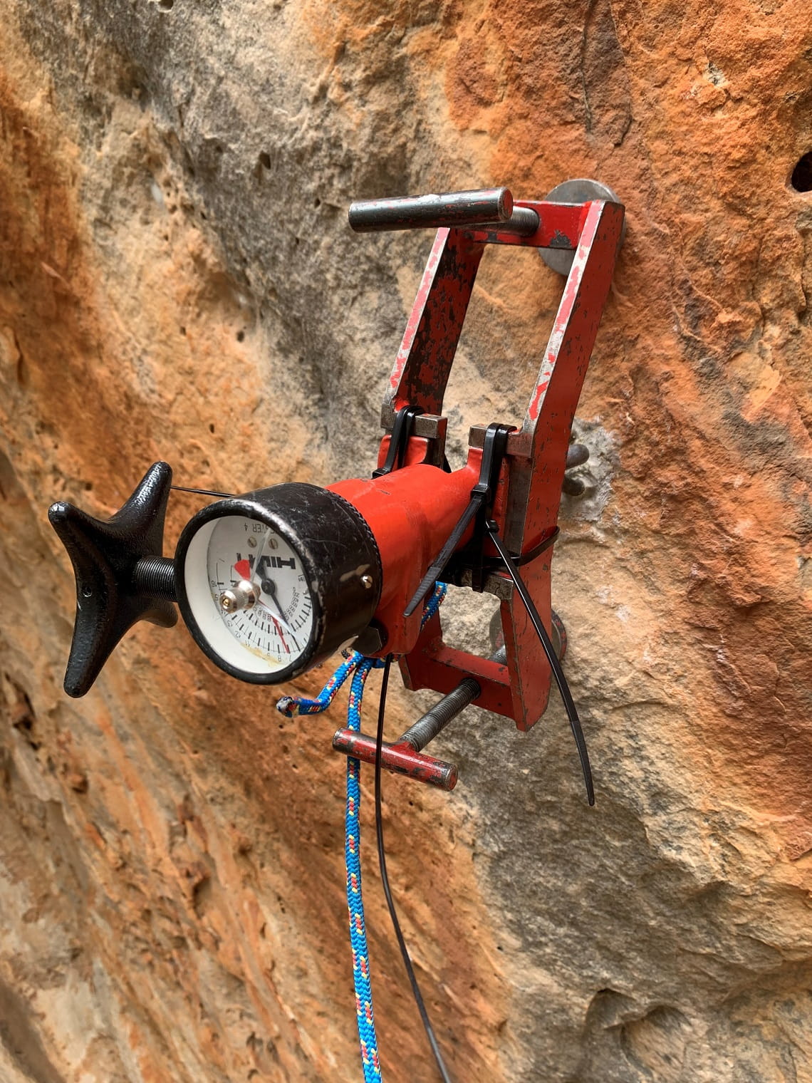 Before fixed bolts are removed they are load-tested by rope access technicians.