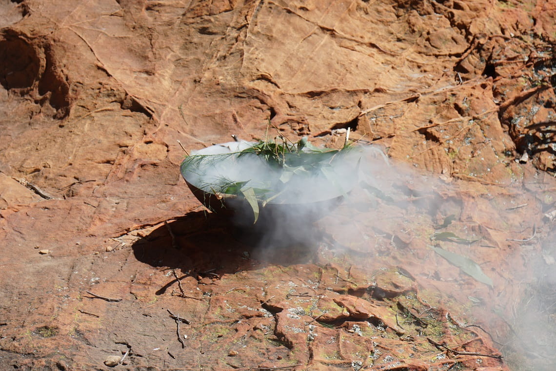 A daily smoking ceremony was held during Rock Art shelter rehabilitation works in Gariwerd Cultural Landscape 