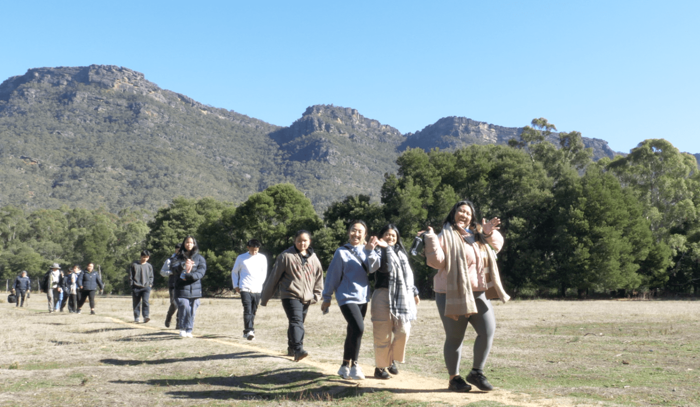 A group of young people hiking in Grampians (Gariwerd) National Park