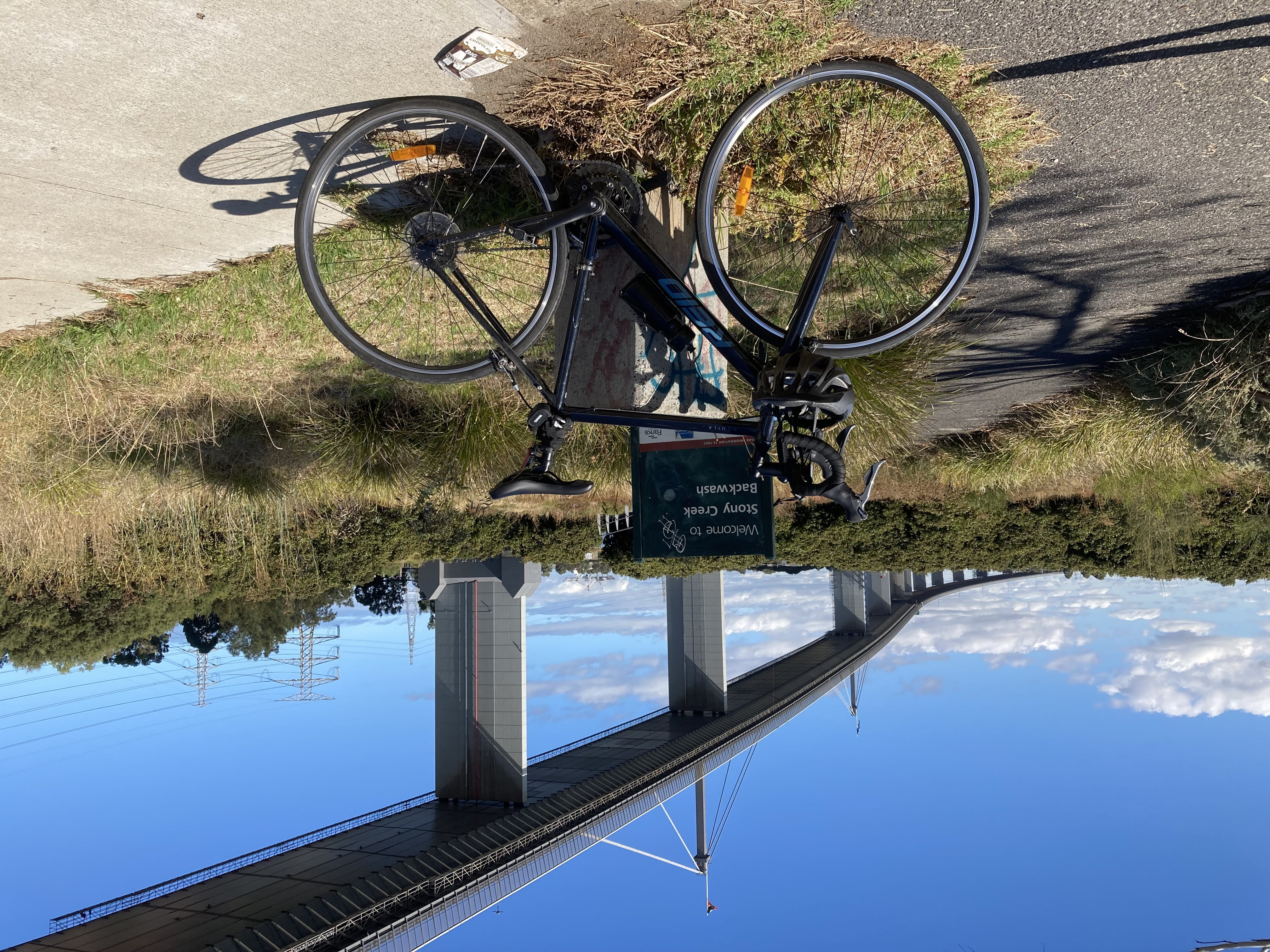 A bike leans on a sign saying 