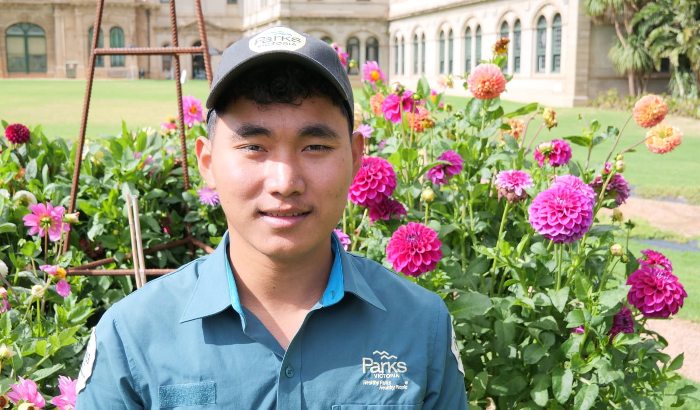 Nay Kaw with colourful flowers of Werribee Park Mansion.
