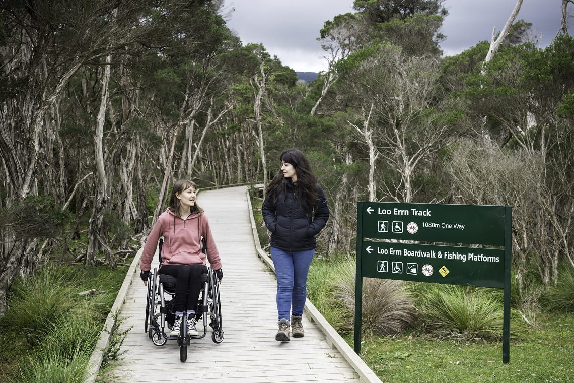 Two people using accessible pathway at Wilsons Promontory National Park 