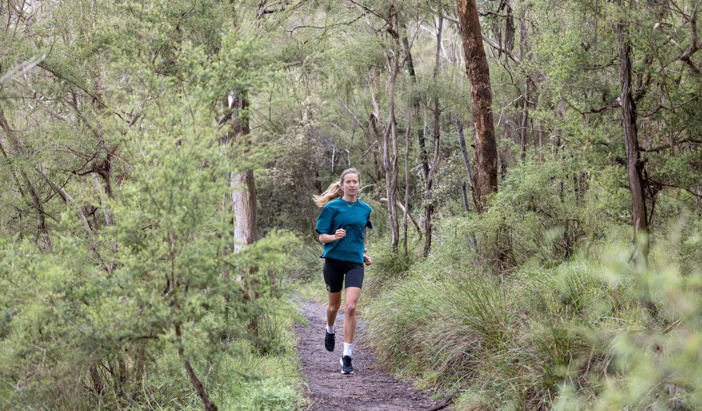 Erchana Murray-Bartlett running through Warrandyte State Park.