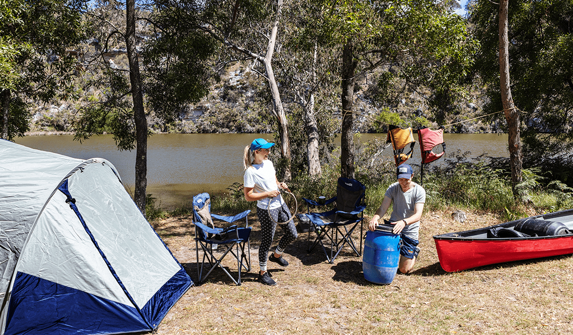 A couple camping along the Glenelg River at Lower Glenelg National Park