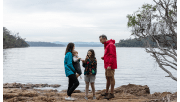 A family beside the water at Mallacoota Inlet, Croajingolong National Park