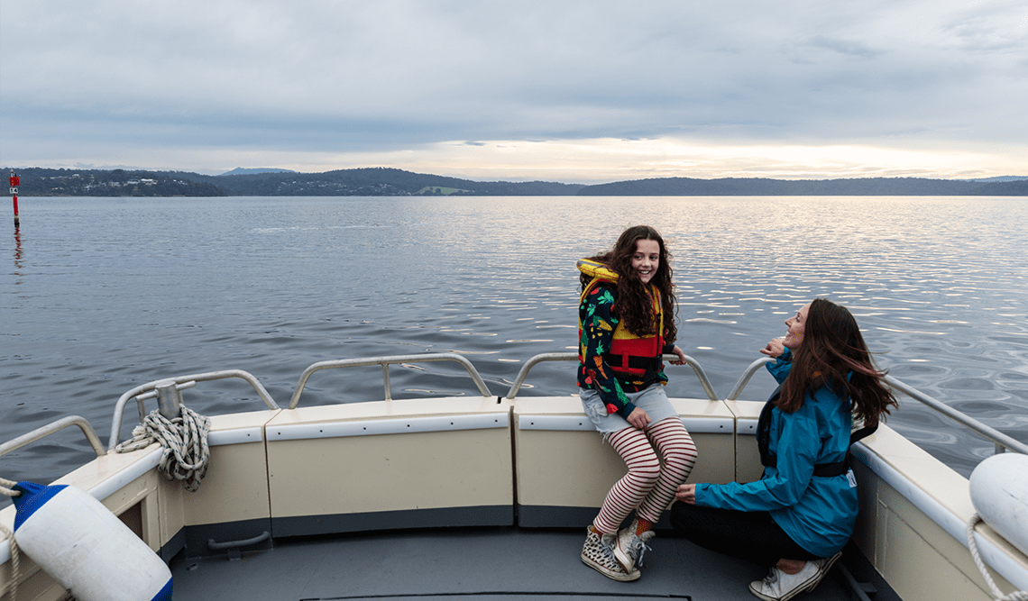 A mother and daughter boating in Mallacoota Inlet, Croajingolong National Park
