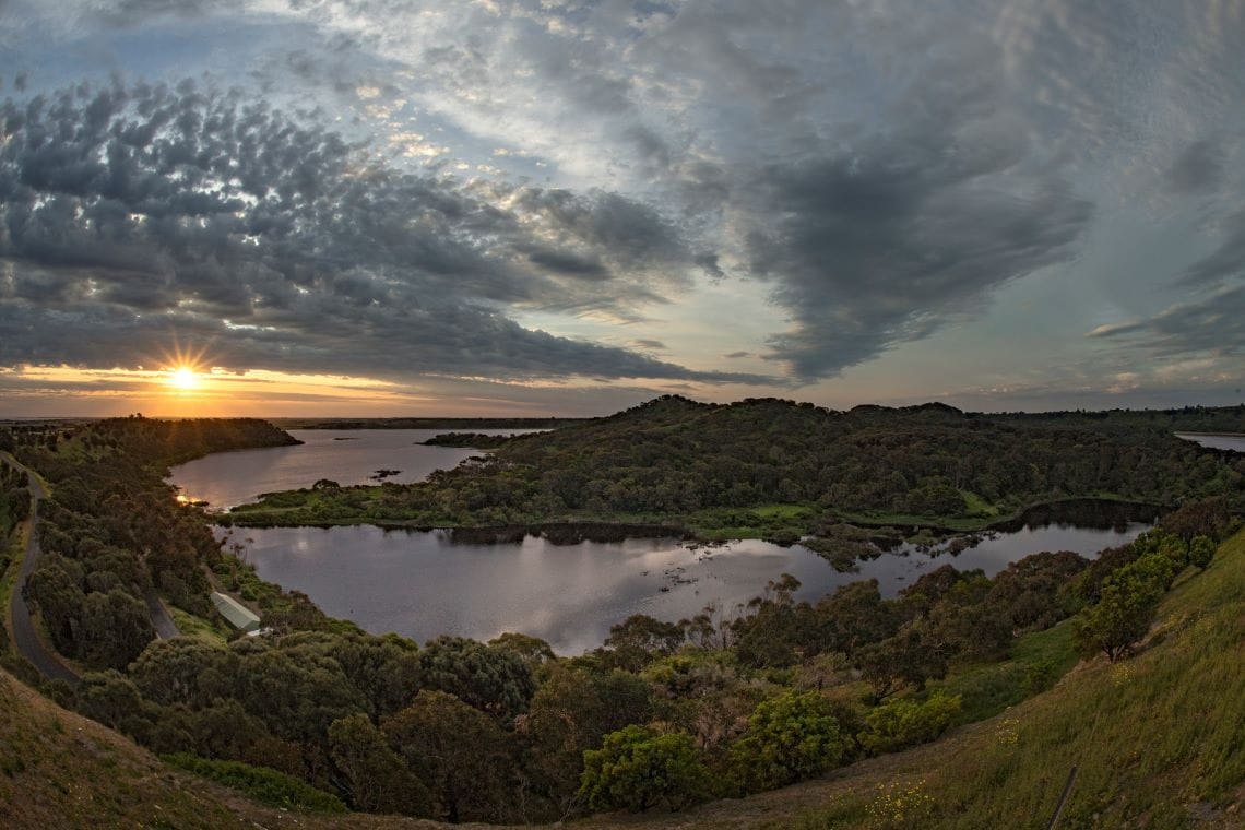 View over a lake with a sunset