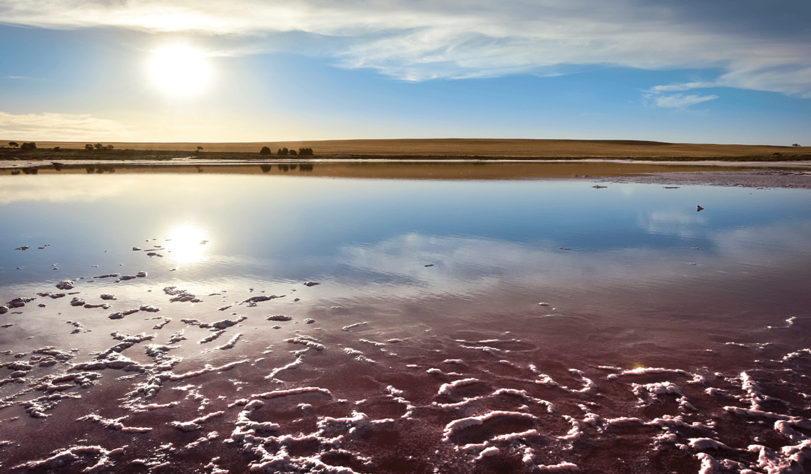 The sun shining over the lake at Lake Tyrrell