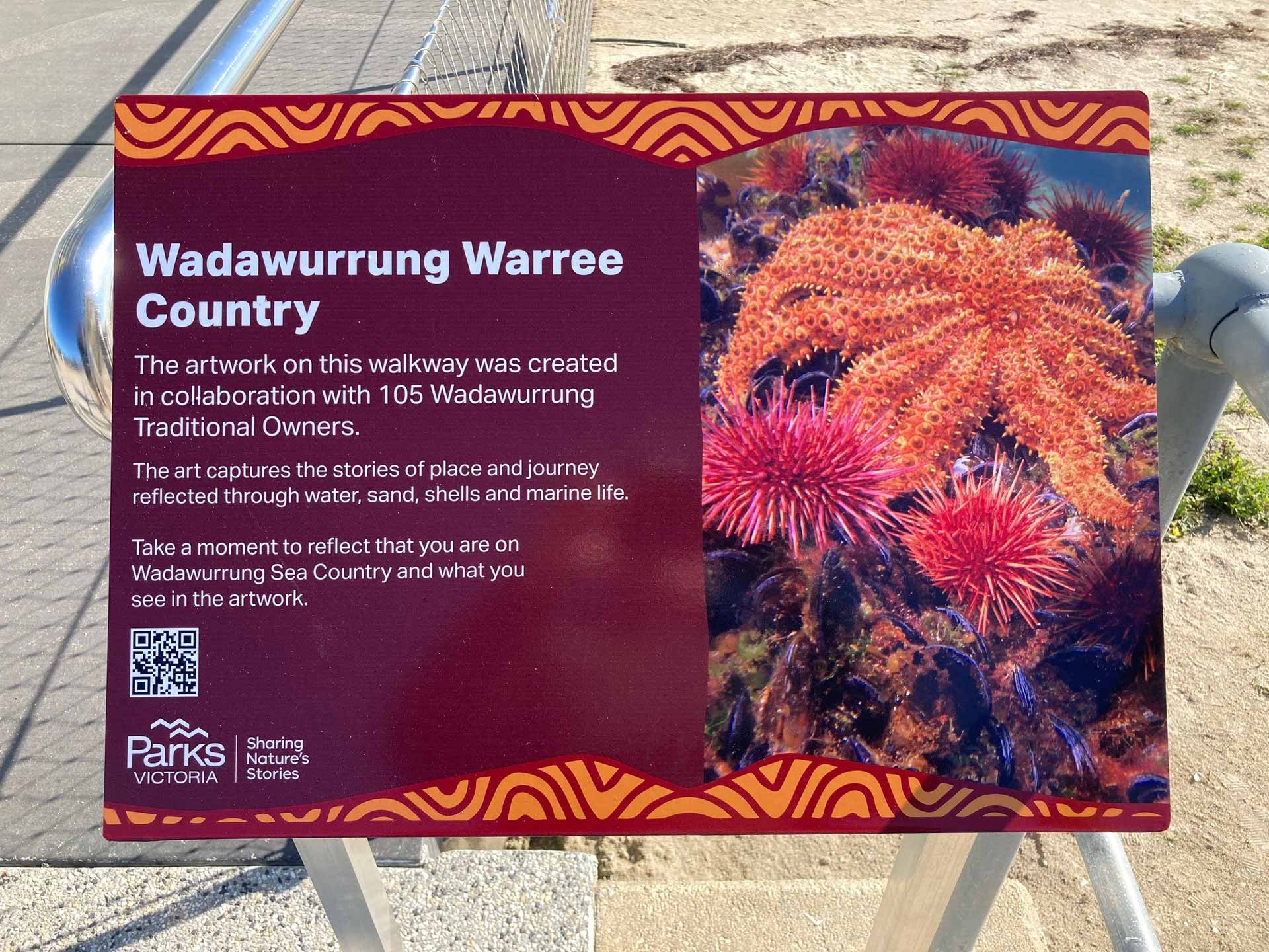 Portarlington Pier walkway sign about the collaboration with Wadawurrung artists