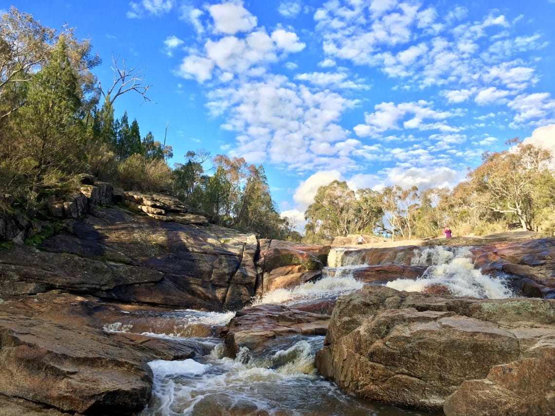 Water cascading down the rocks at Woolshed Falls