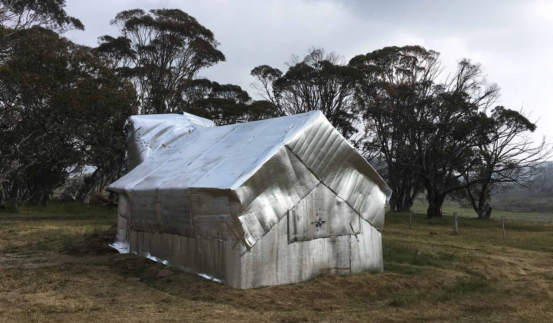 Wrapping high country hut