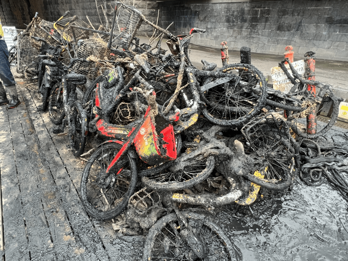 A pile of rusted and dirty bikes and other things hauled out of the Yarra by divers.