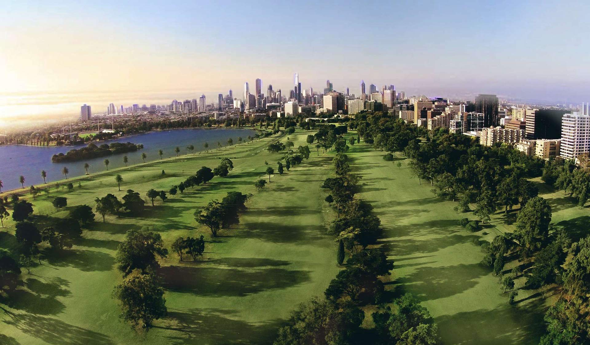 Albert Park Golf Course with views of Melbourne's CBD skyline in the background. 