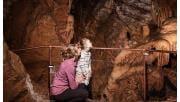 Family exploring Royal cave, Buchan Caves Reserve