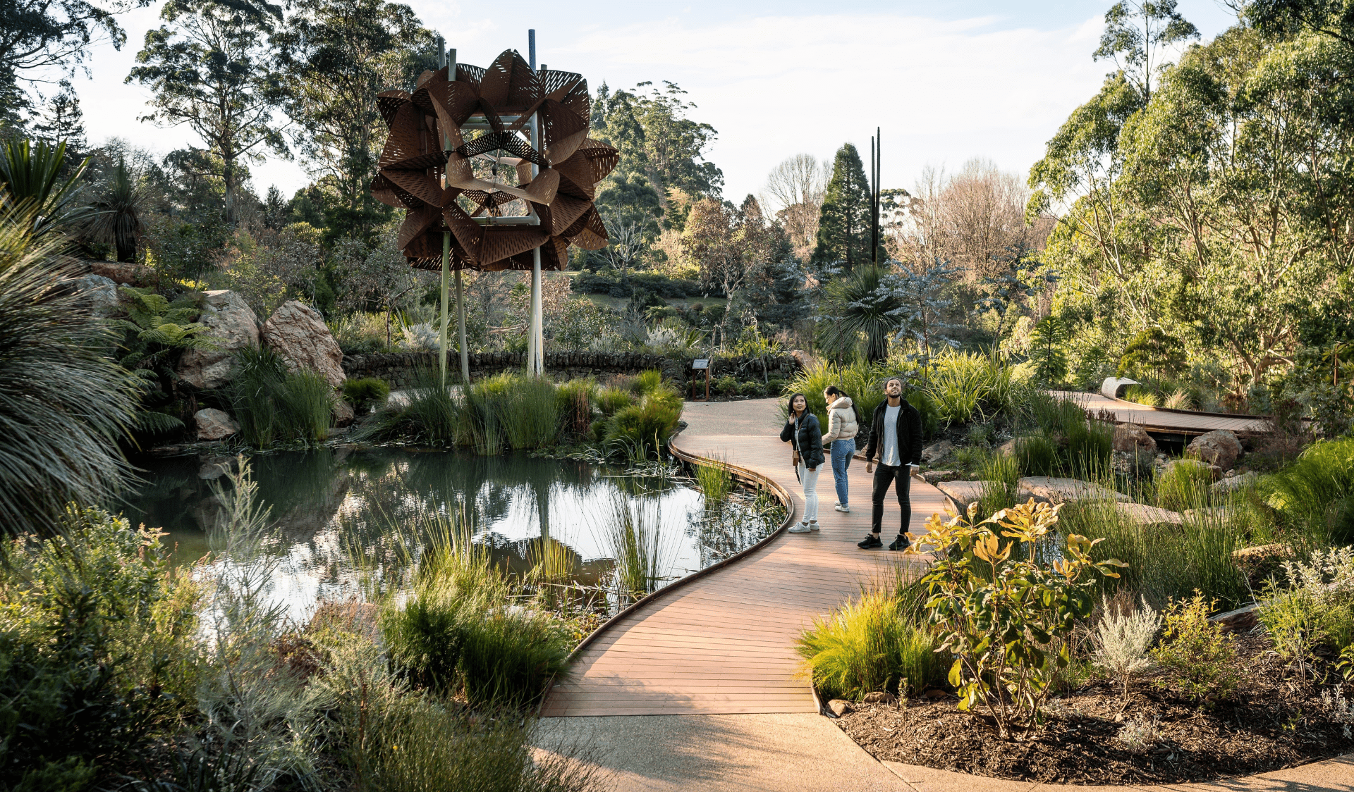 Friends on walkway at The Dandenong Ranges Botanic Garden - Chelsea Australian Garden