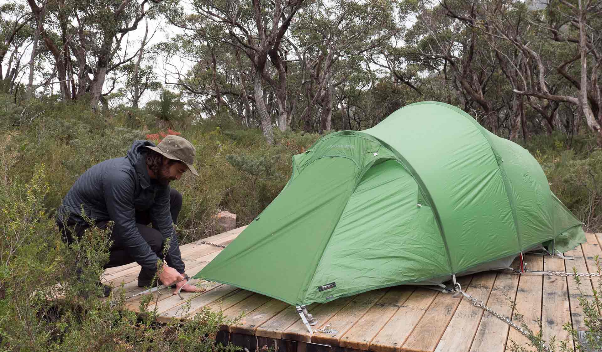 A man sets up his tent at Duwal hiker camp at the end of central section 3 on the GPT