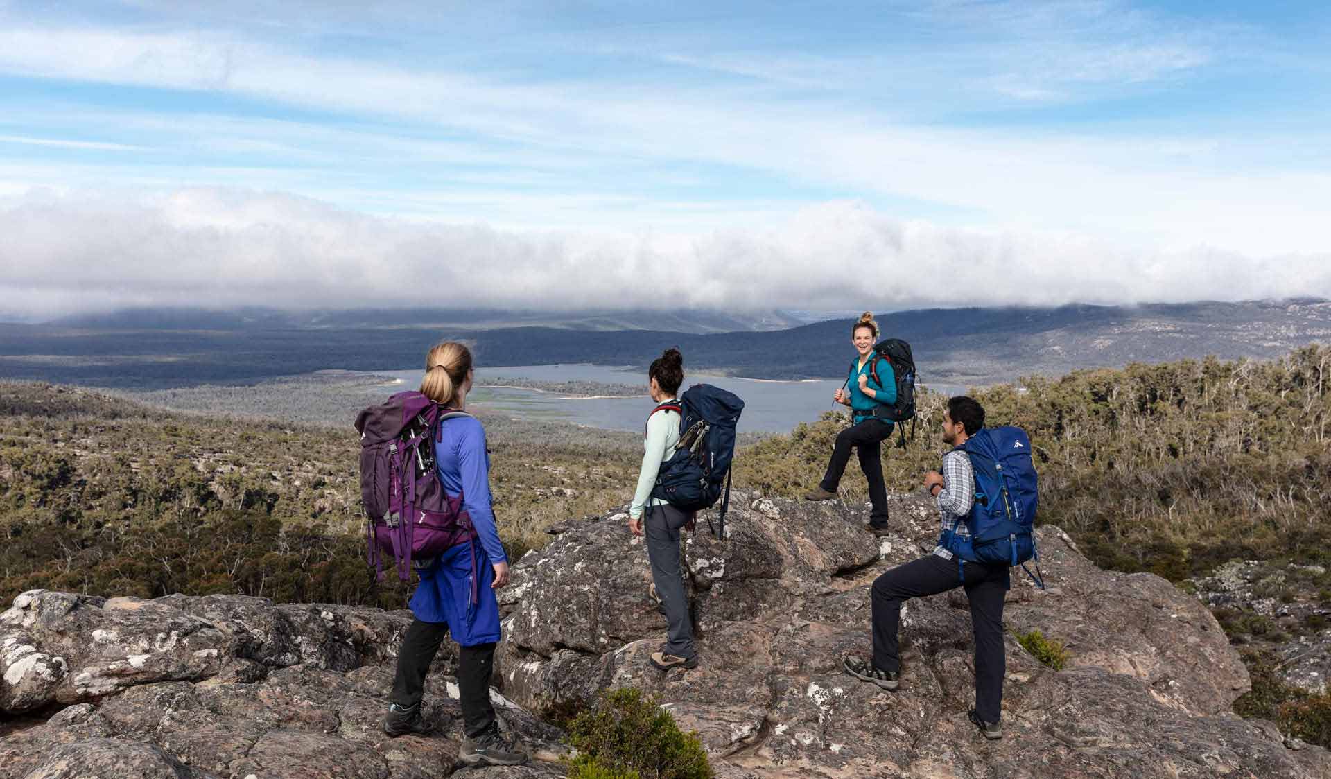 A group of four walkers stop to take in the view of Wartook Reservoir on northern section 3 of the GPT
