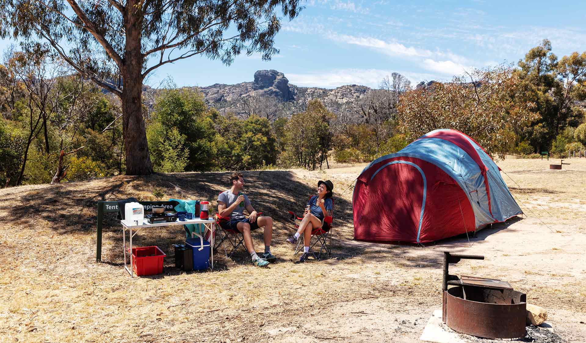 A couple in their twenties camp at the Mt Stapylton Campground in the Grampians National Park.
