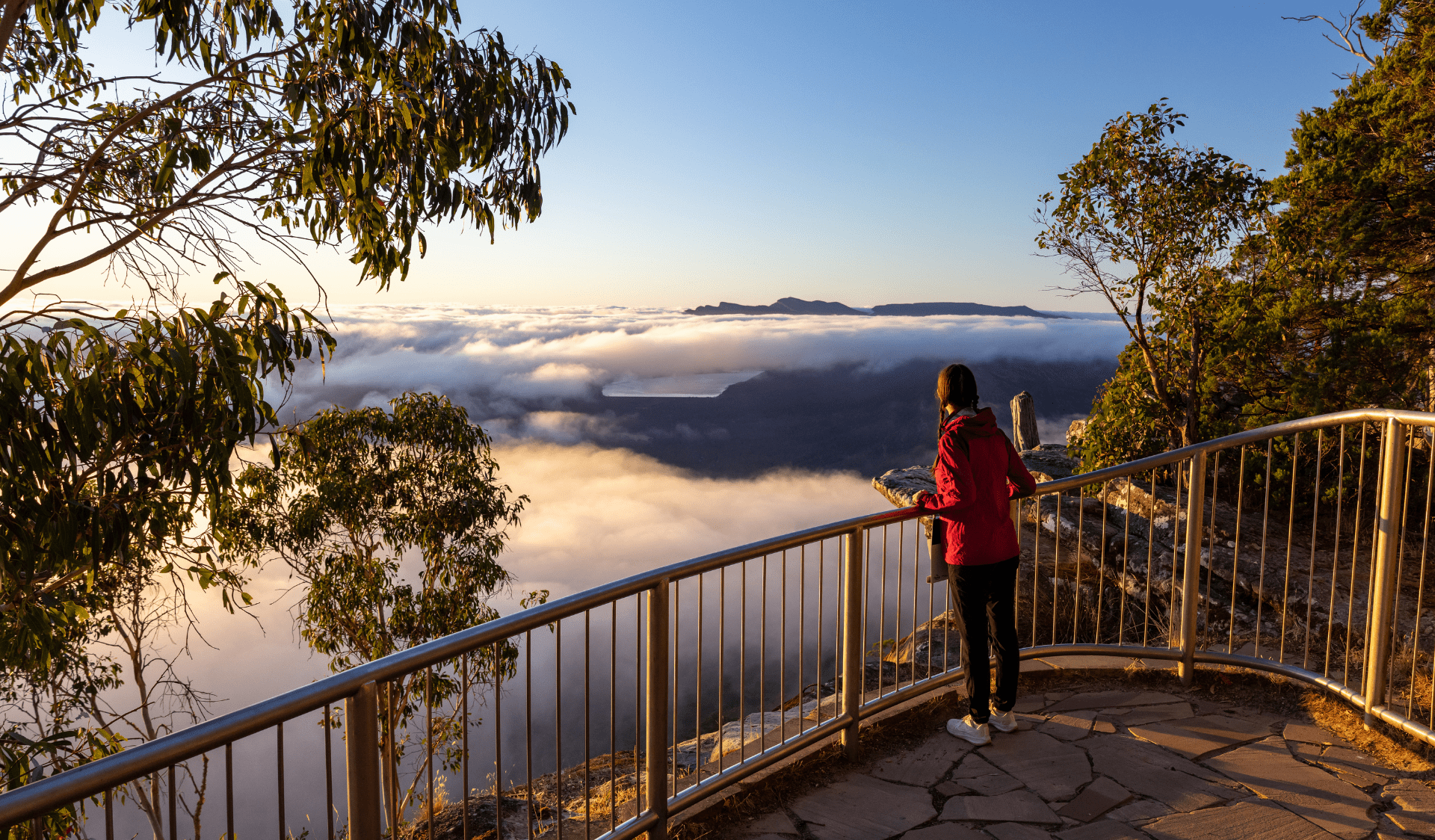 Person watching the sunrise at Boroka Lookout in Grampians National Park