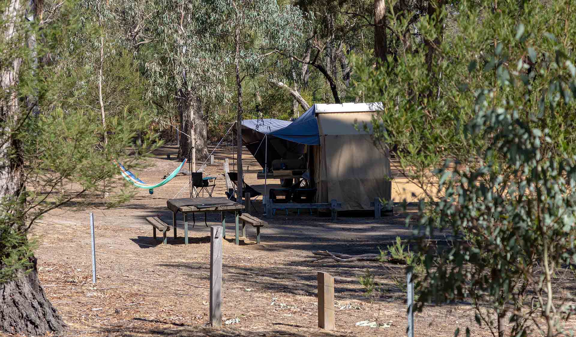 A tent and hammock set up at Buandik Campround in the Grampians National Park