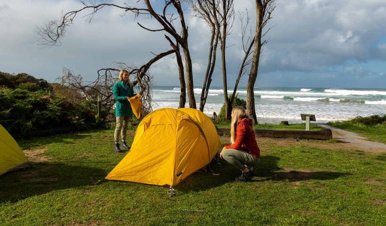 Setting up tents at Blanket Bay Campground in the Great Otway National Park