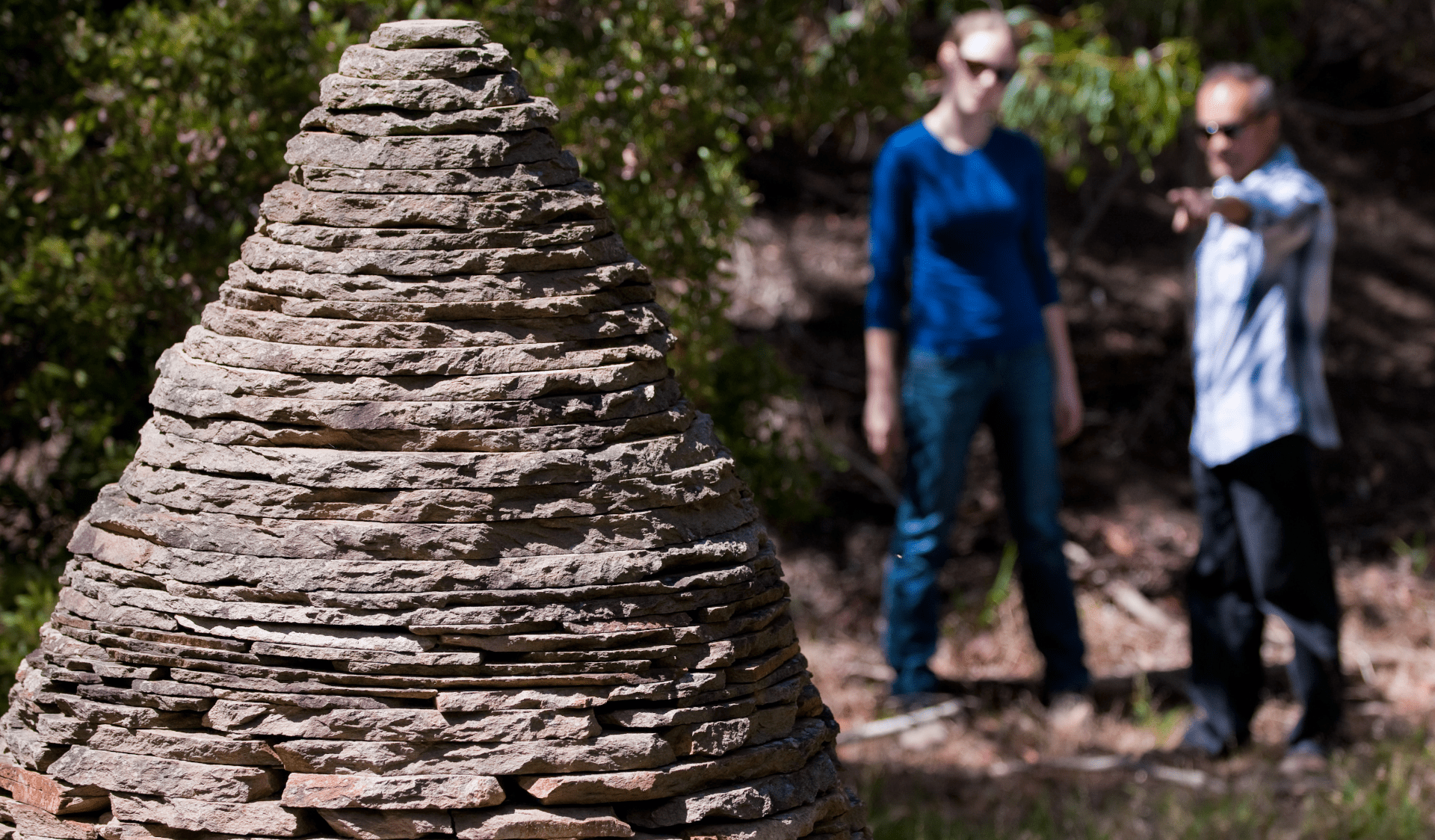 Two friends admire a sculpture in Herring Island Environmental Sculpture Park